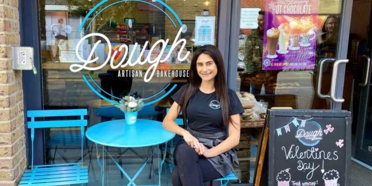 Carina Lepore sitting outside Dough Artisan bakehouse